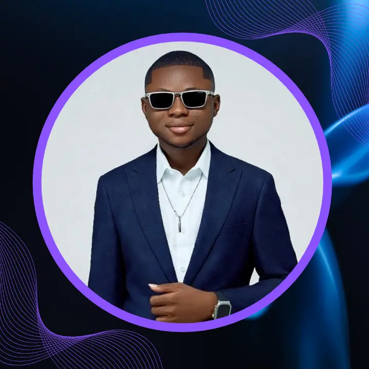 Rabiu Yusuf in a navy suit and white shirt